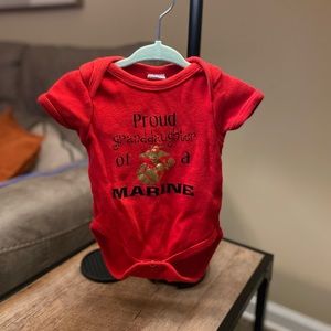 “Proud granddaughter of a marine” red onesie 3-6m